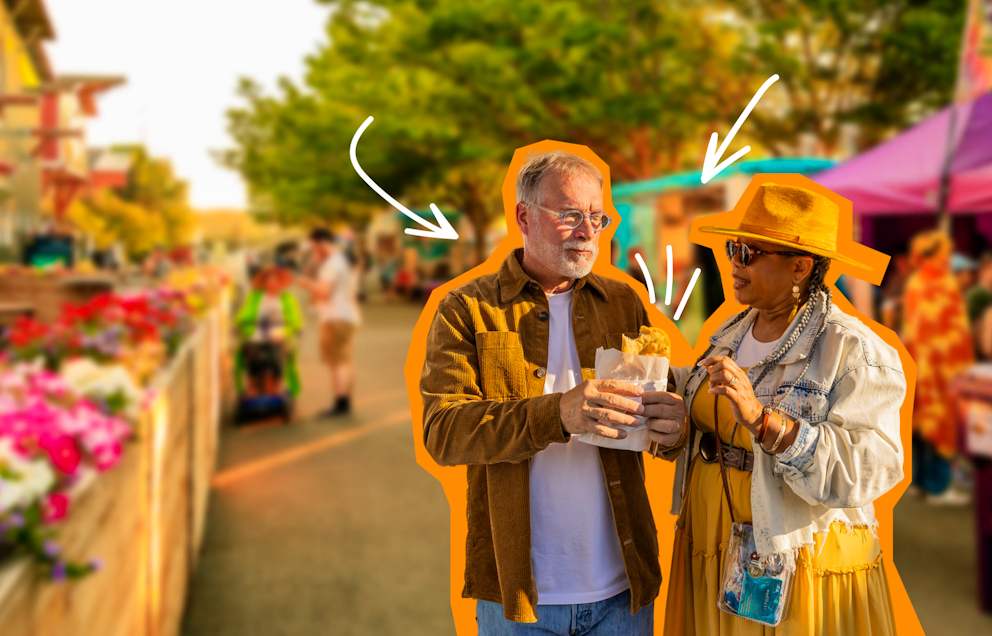 A couple enjoys some food in a summery setting at The Taste NW.