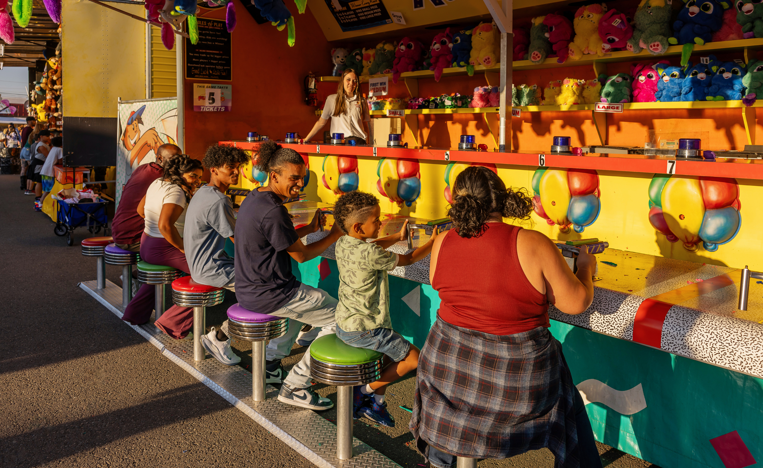 Families playing games at the Washington State Fair