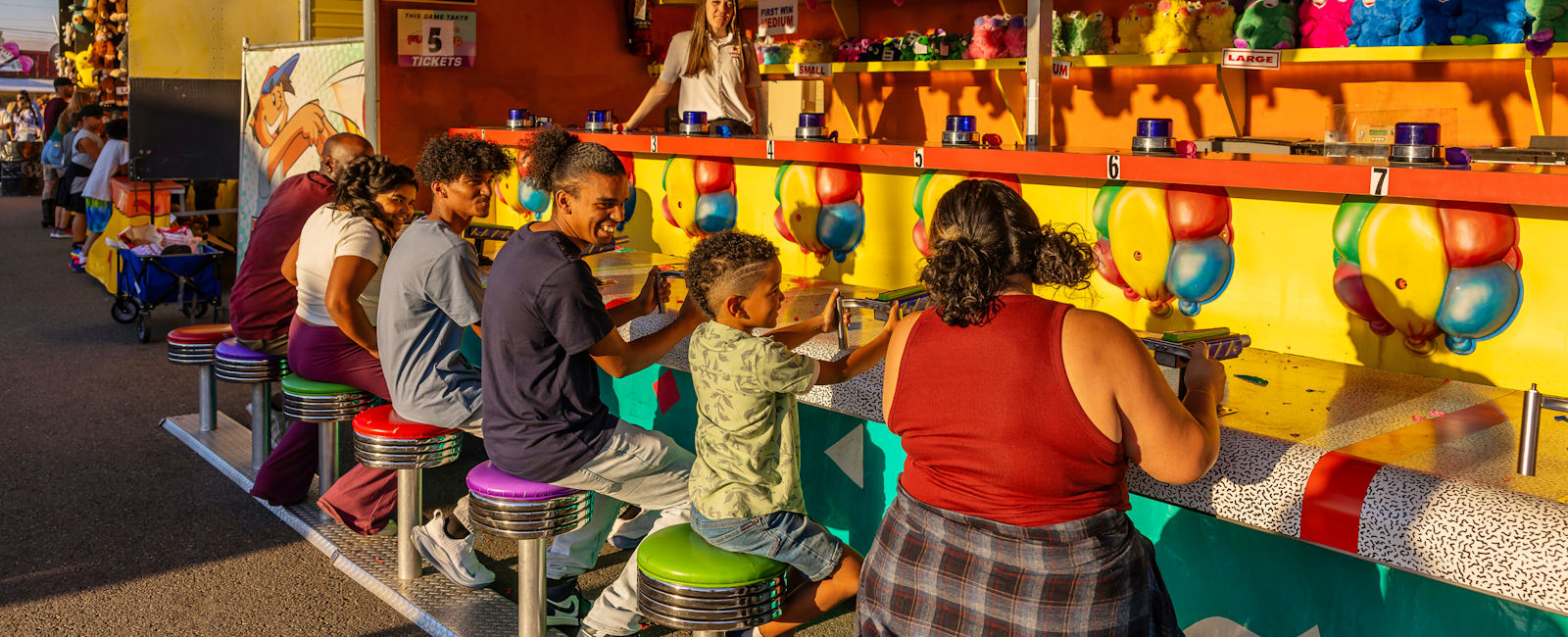 Families playing games at the Washington State Fair