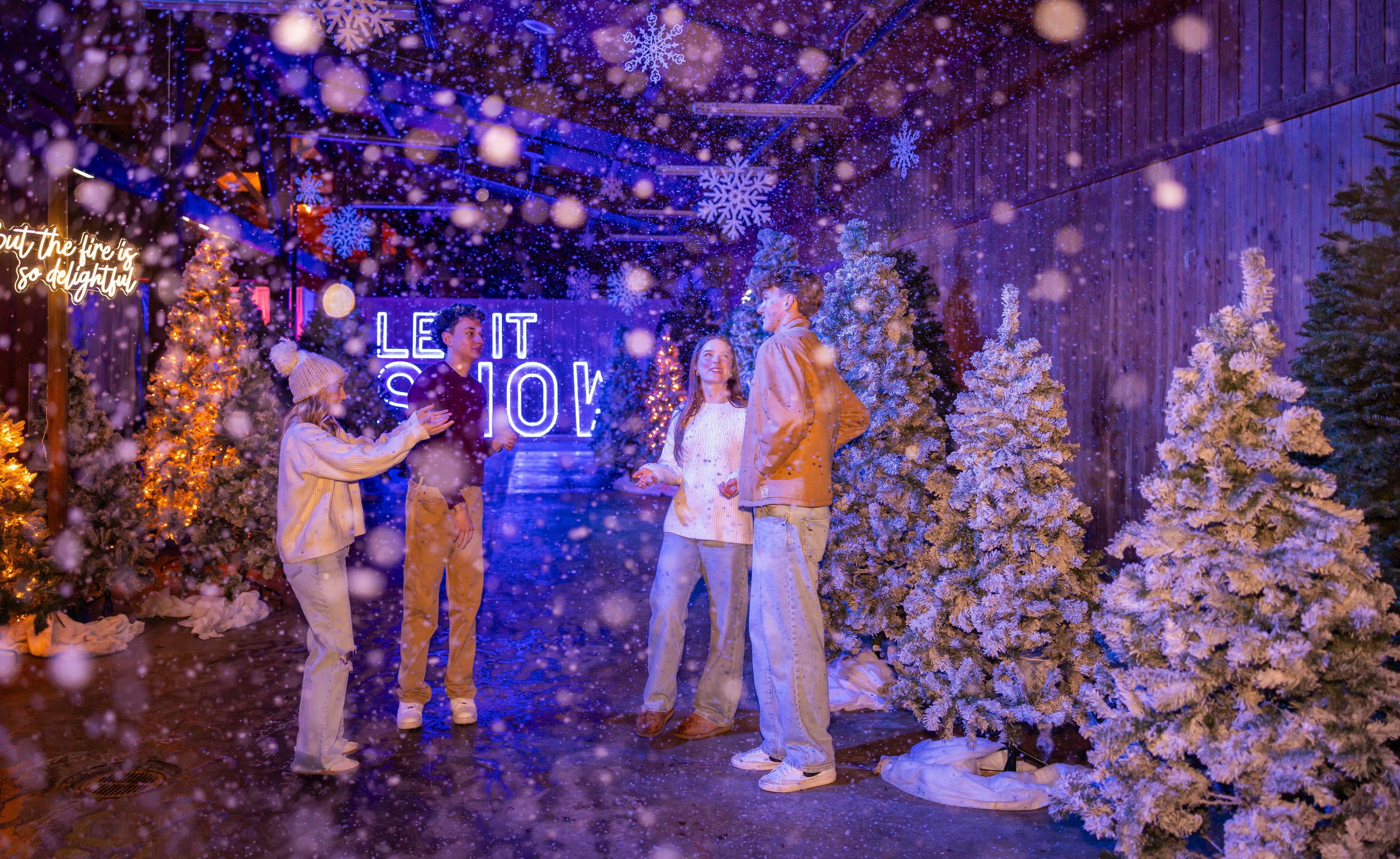 Teens in Let It Snow with Snow Falling