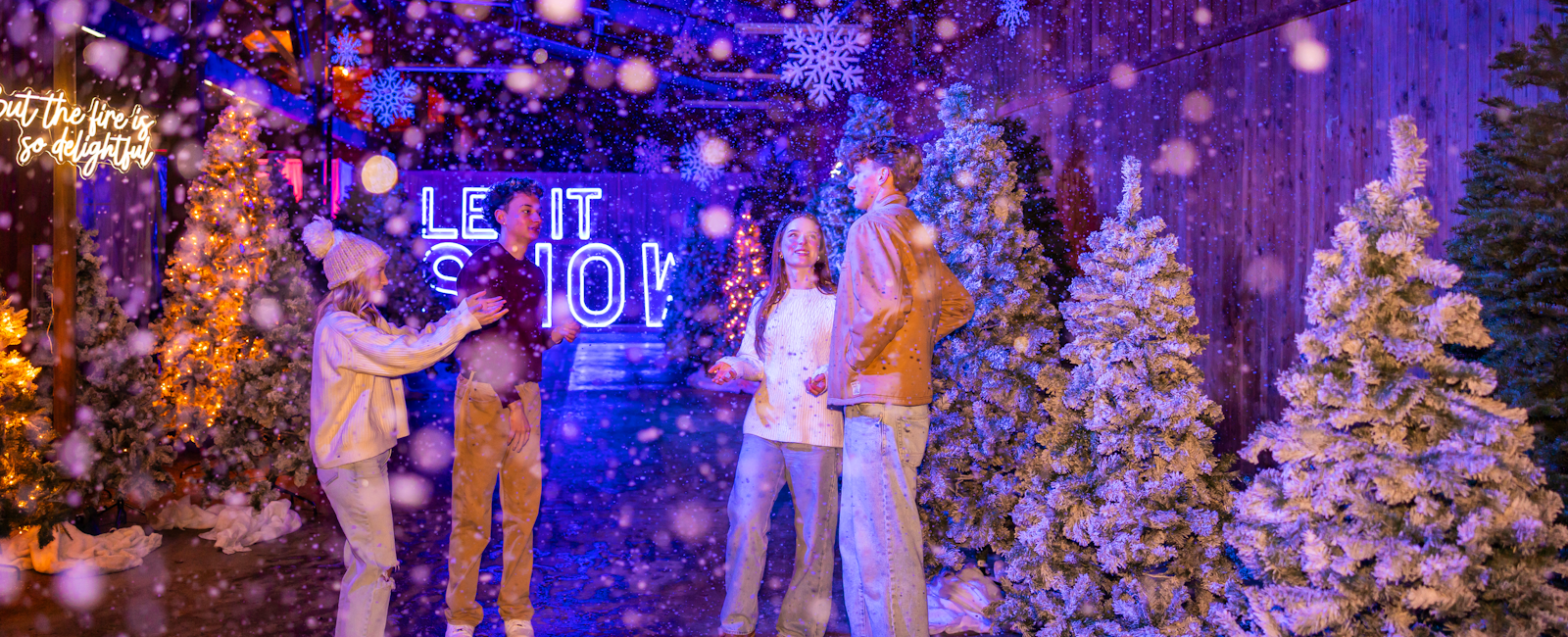 Teens in Let It Snow with Snow Falling