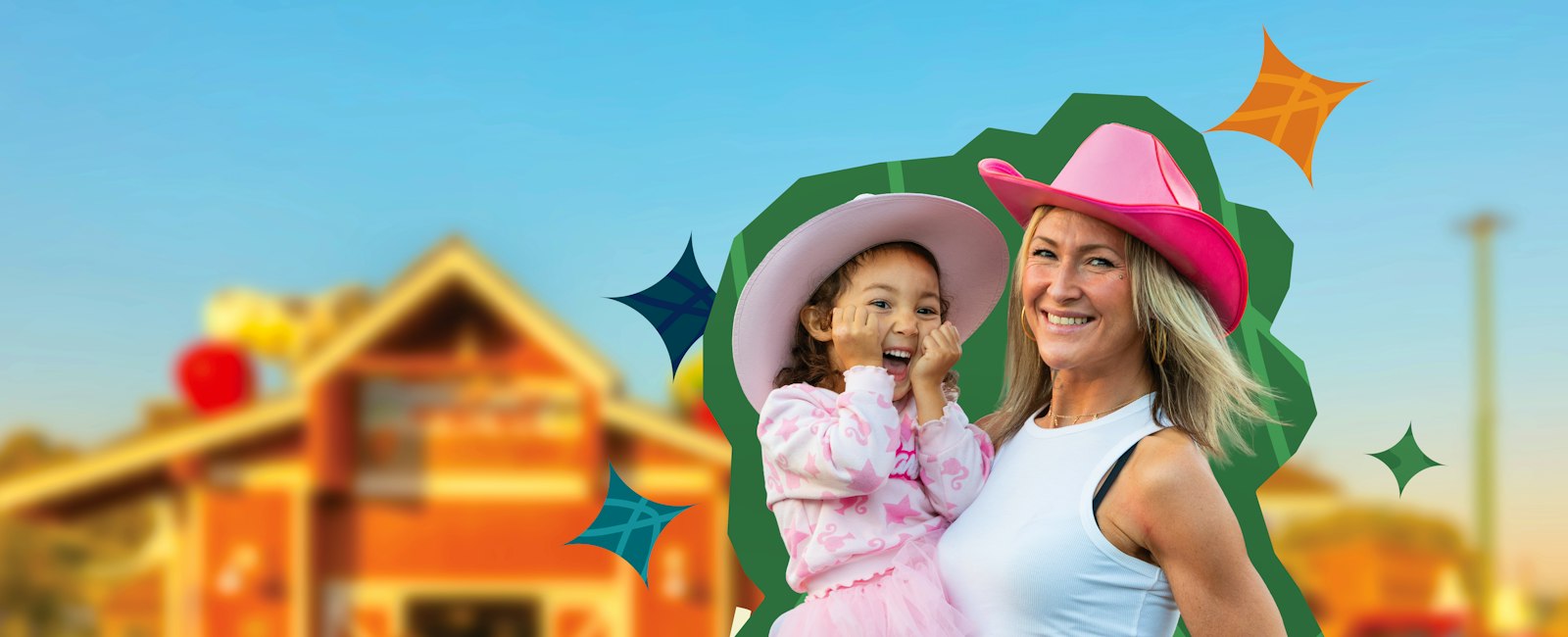 A little girl and her mom smiling at the camera, both wearing pink cowboy hats and surrounded by an illustrated green outline with colorful diamond shapes around them.