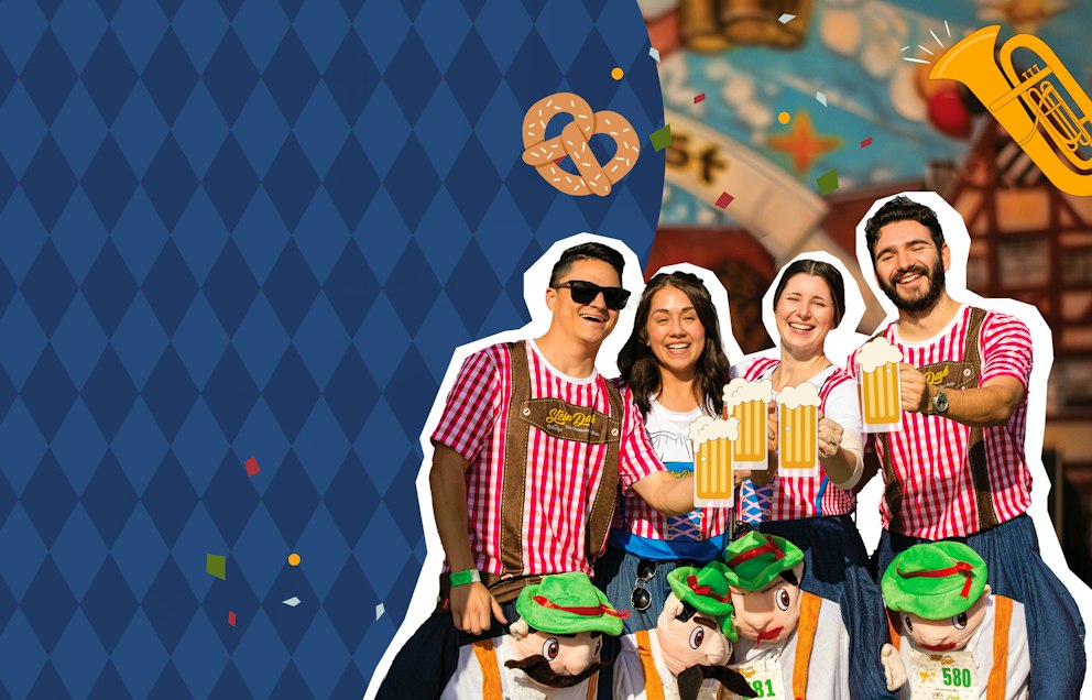 Four friends in matching red gingham outfits with lederhosen hold up animated beers.