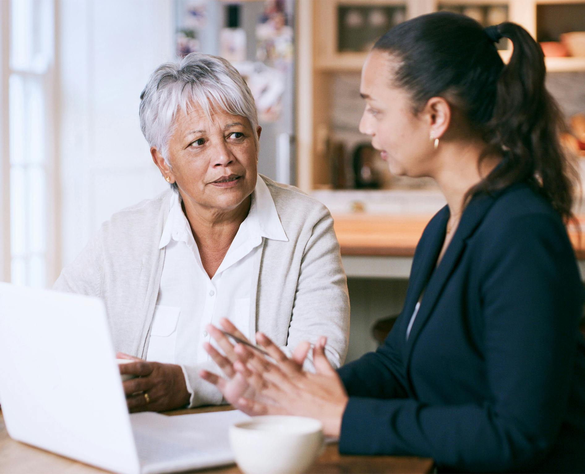 Woman talking to another woman
