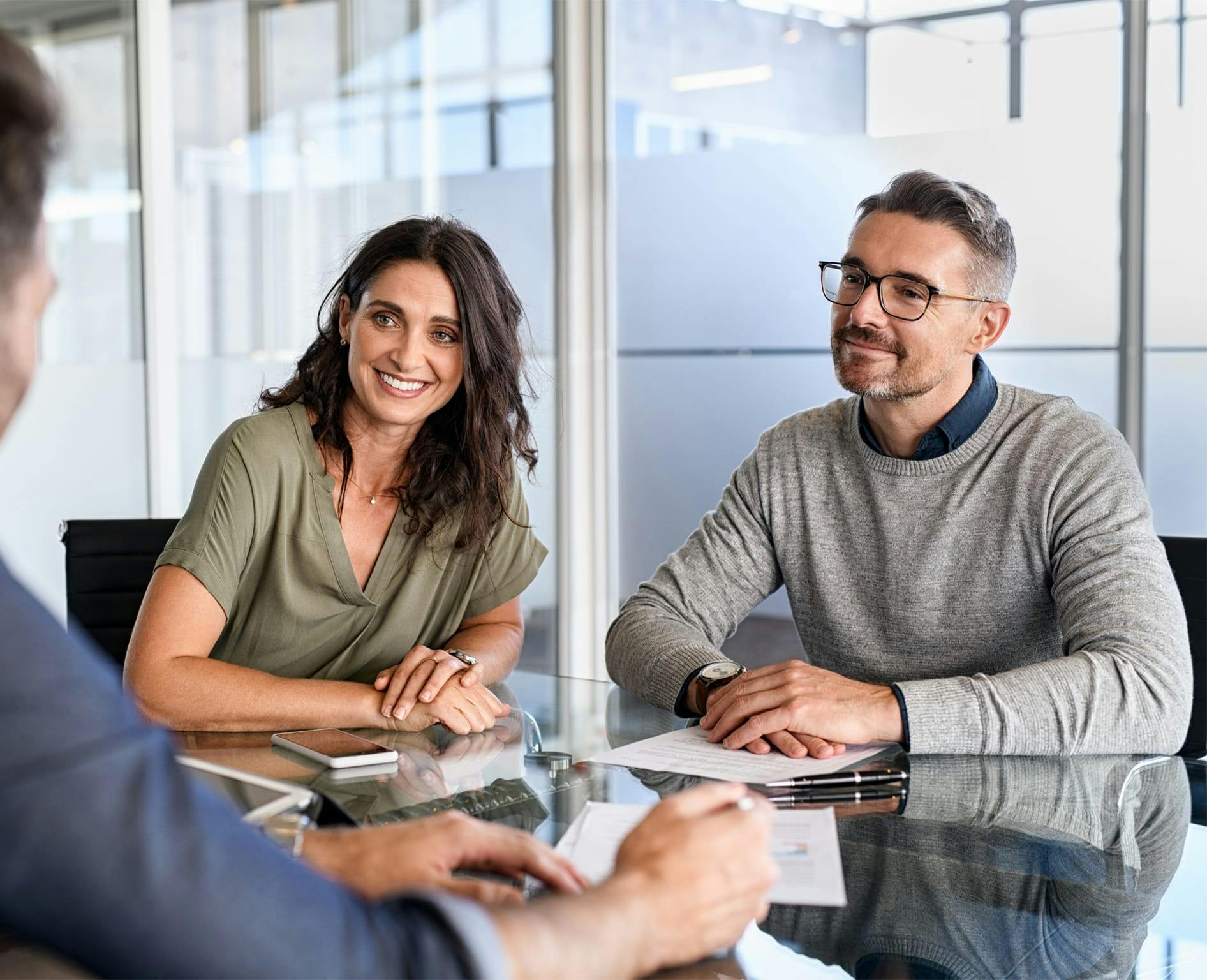 three people having a discussion