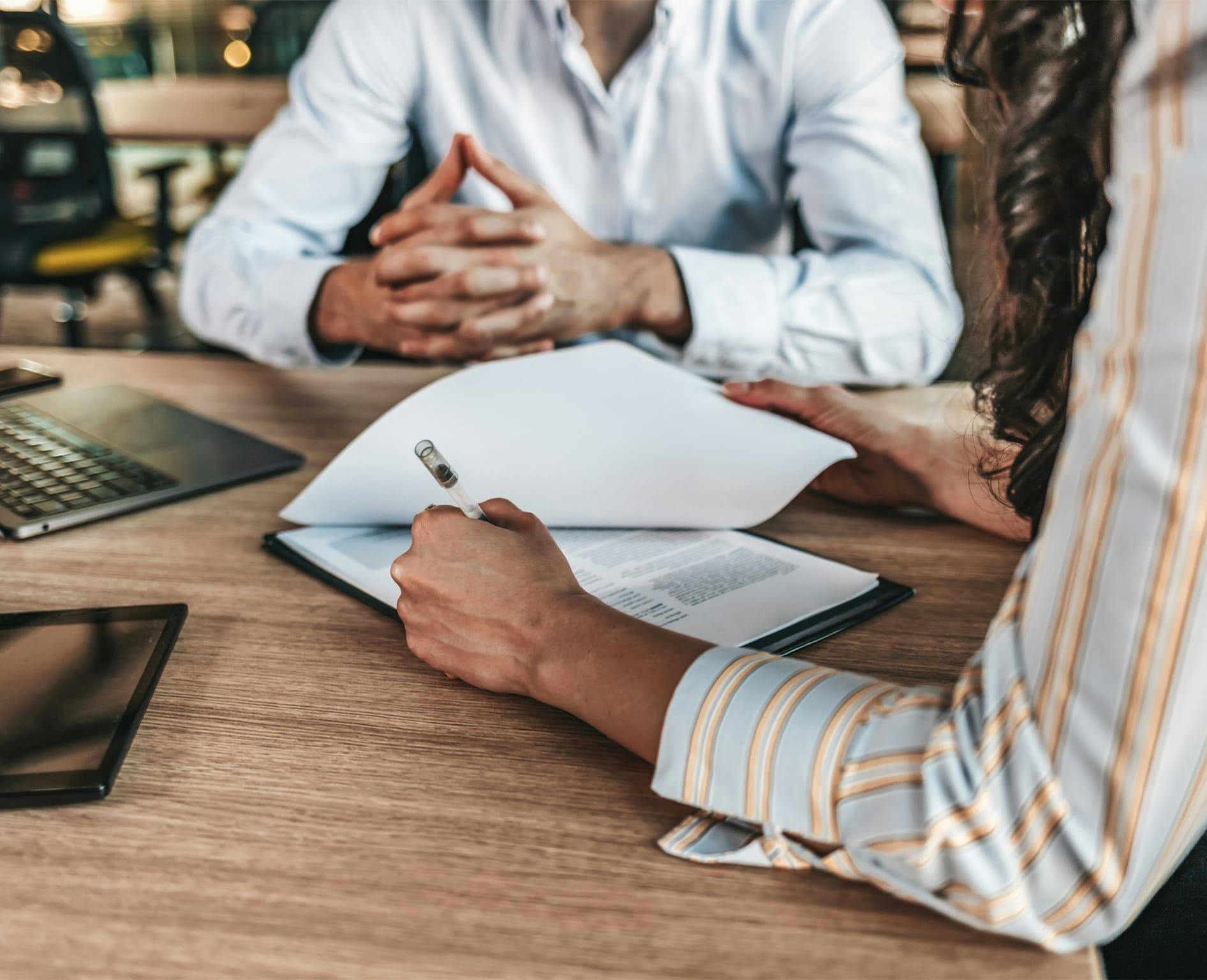 Woman signing contract