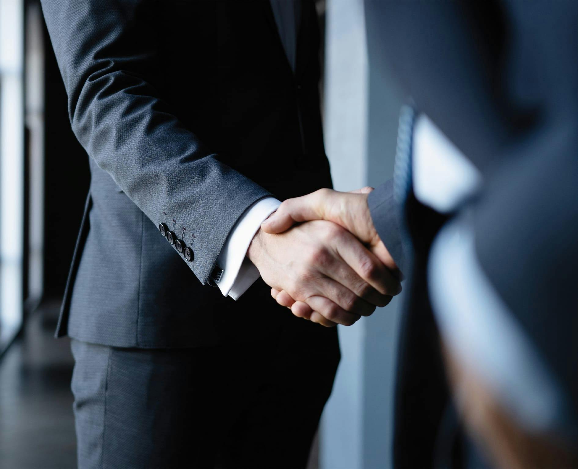 people shaking hands