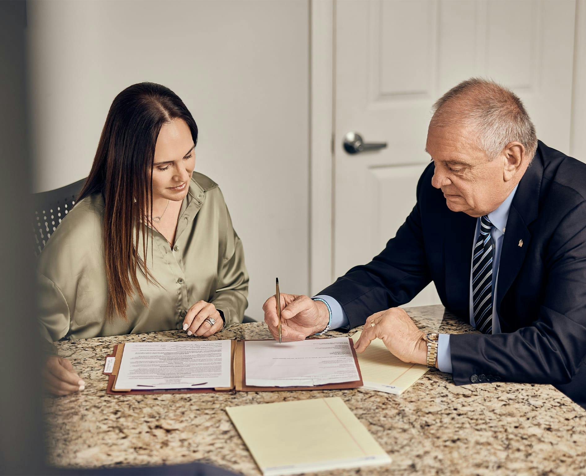 two people working on paperwork