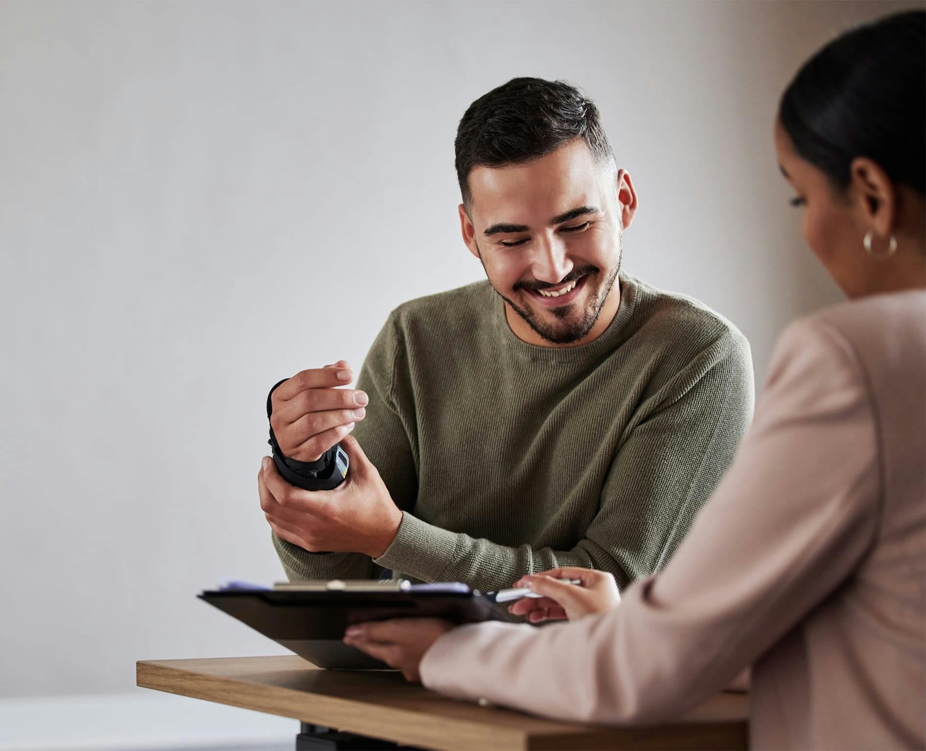 two people looking at clipboard
