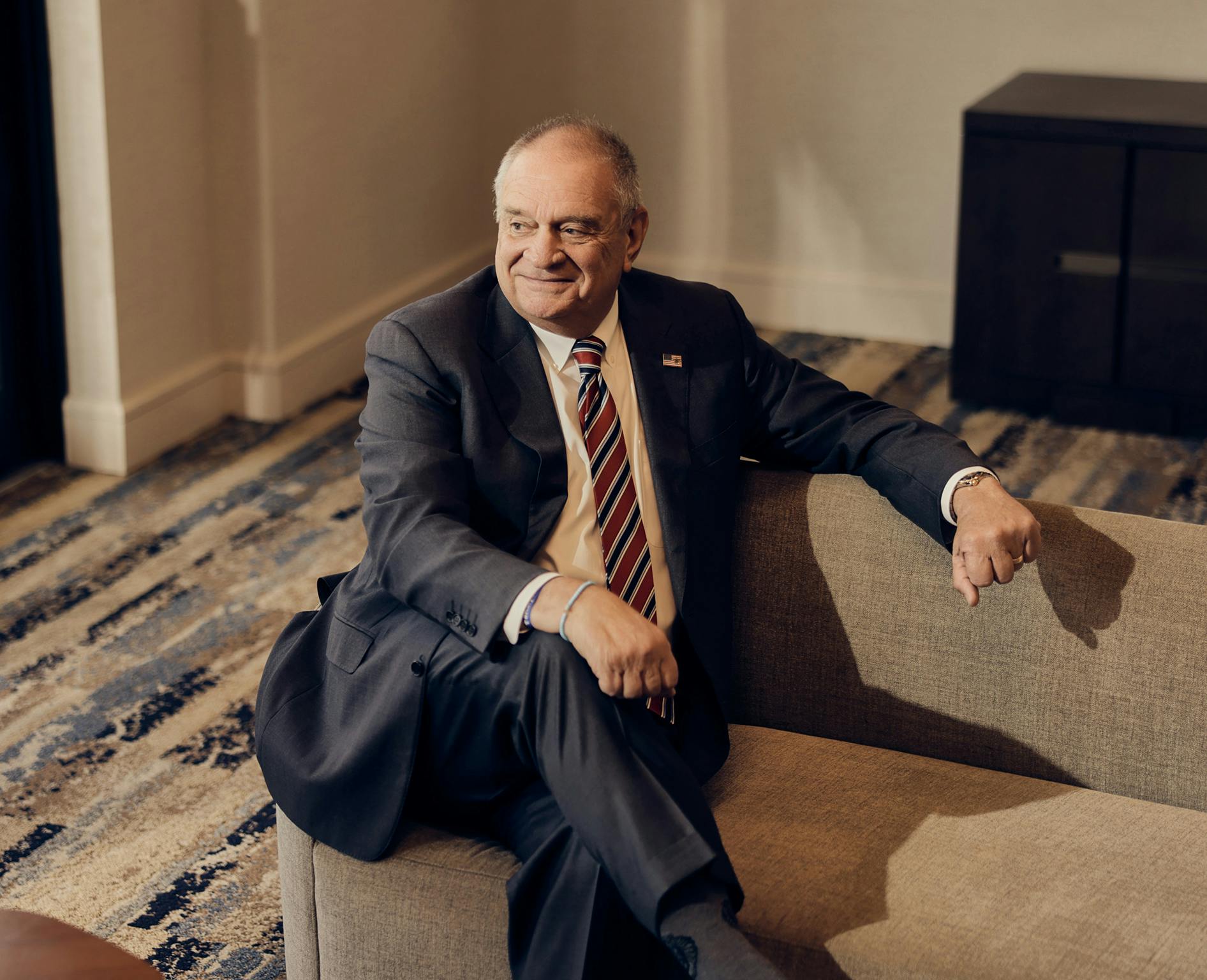 Attorney Roberto Pardo sitting on couch