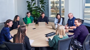 meeting between employees round table