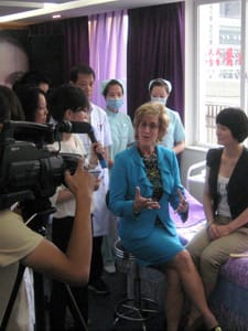 Dr Sherman giving interview