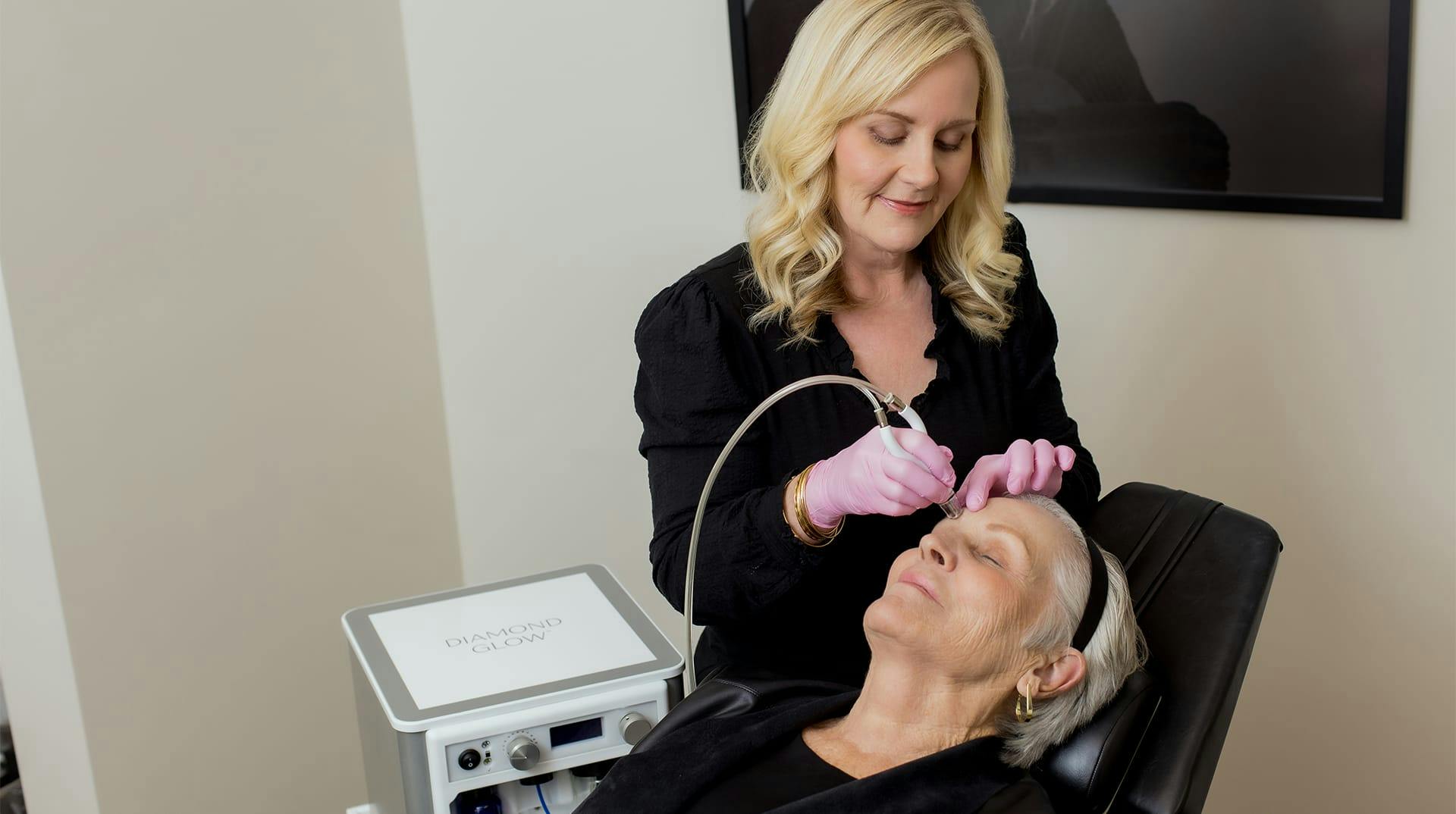 patient receiving facial treatment