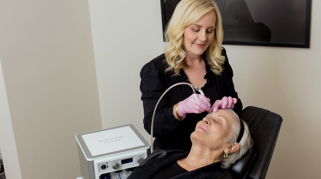 patient receiving facial treatment