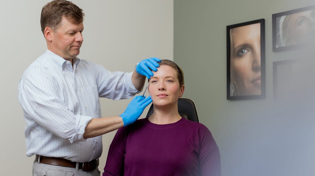 Dr Melson treating patient