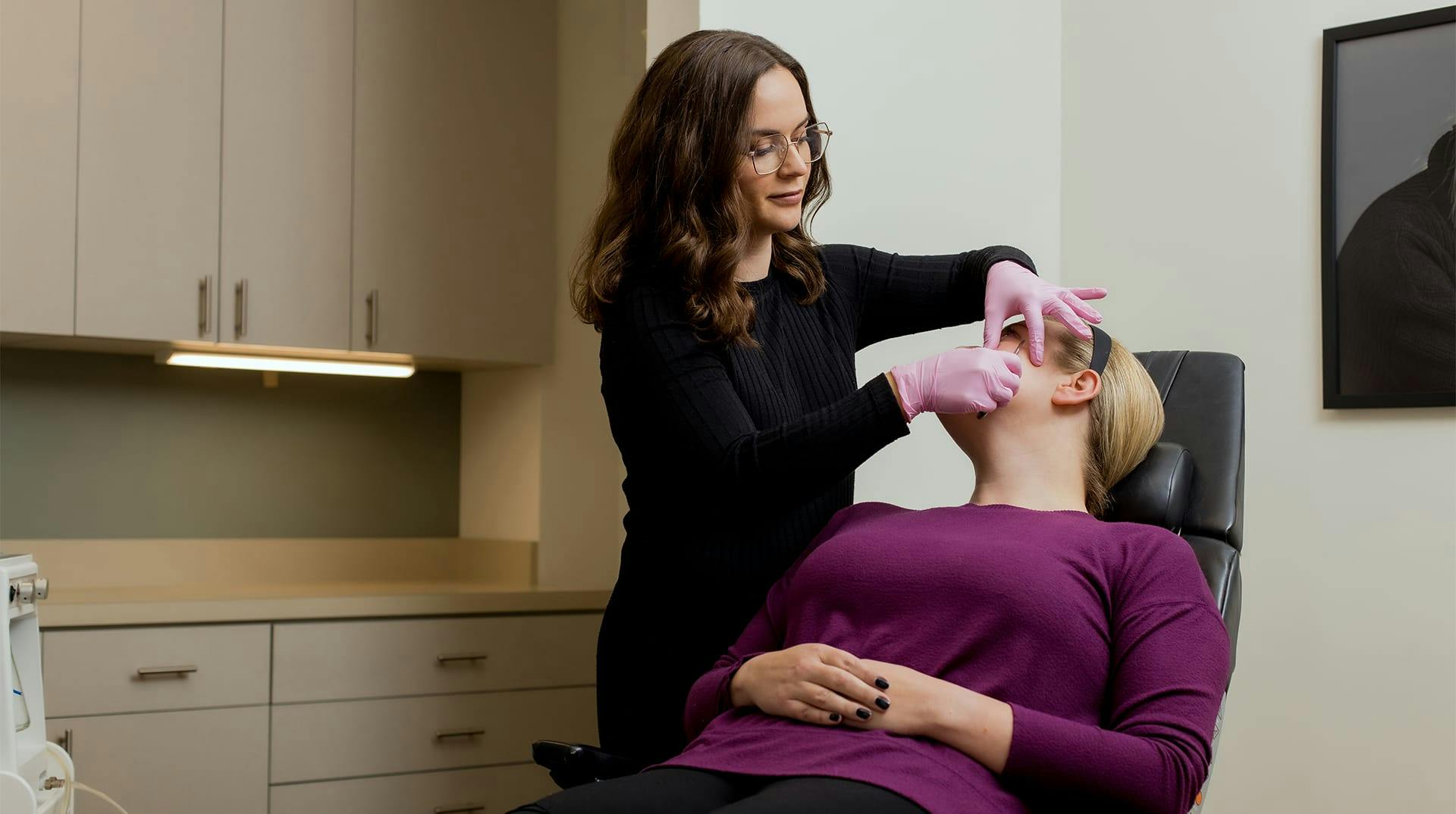patient receiving facial treatment