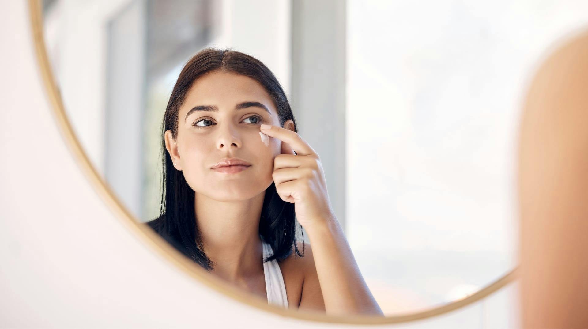 woman applying facial product