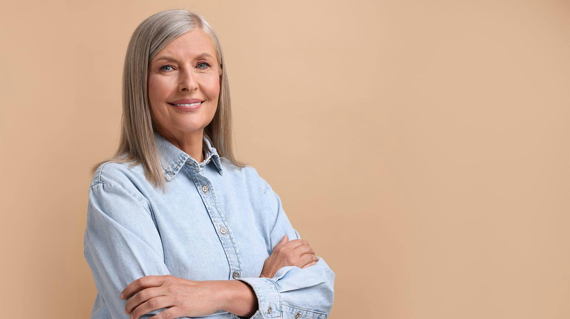 smiling woman with arrms crossed