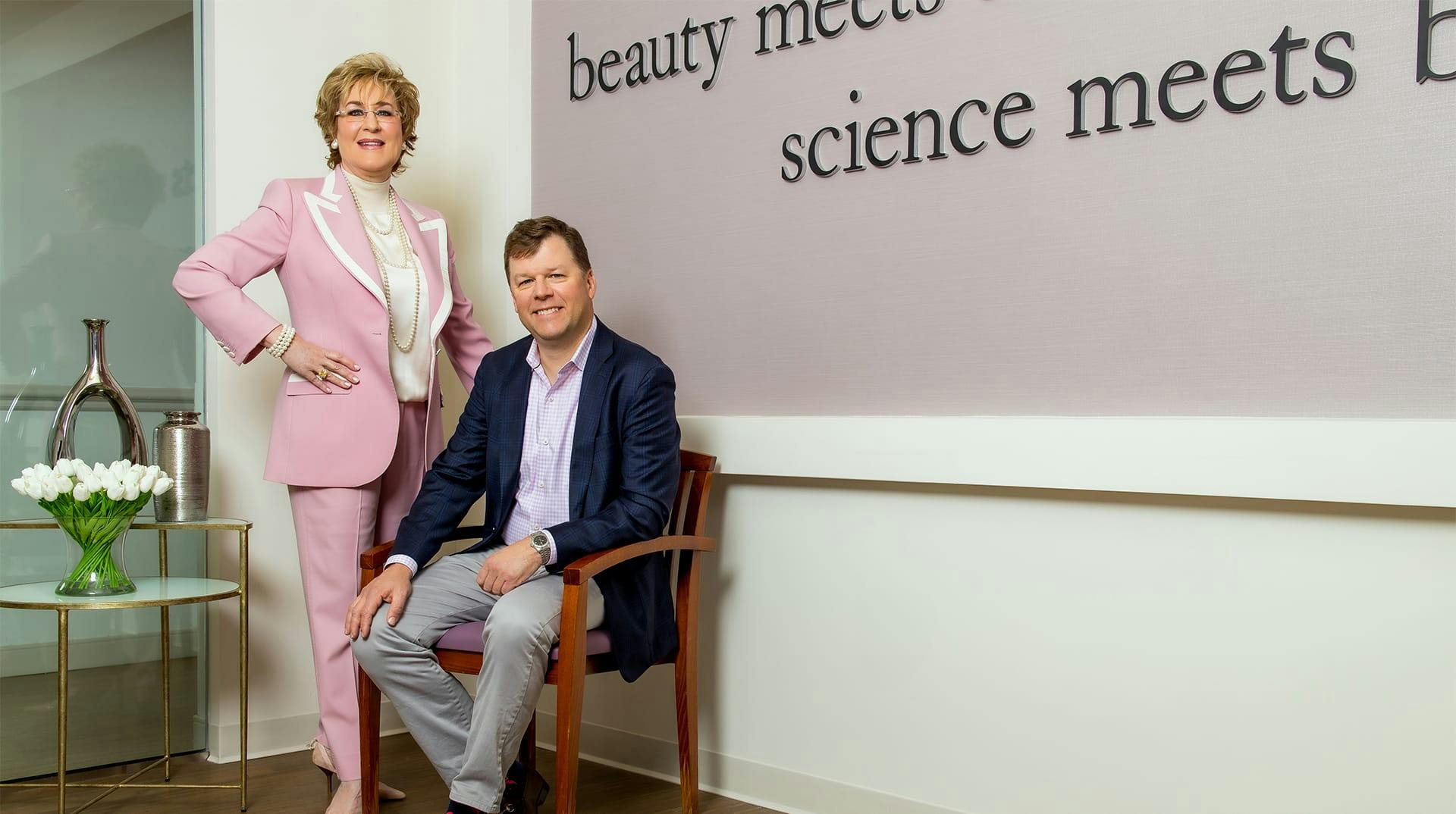 Dr Sherman and Melson in reception area