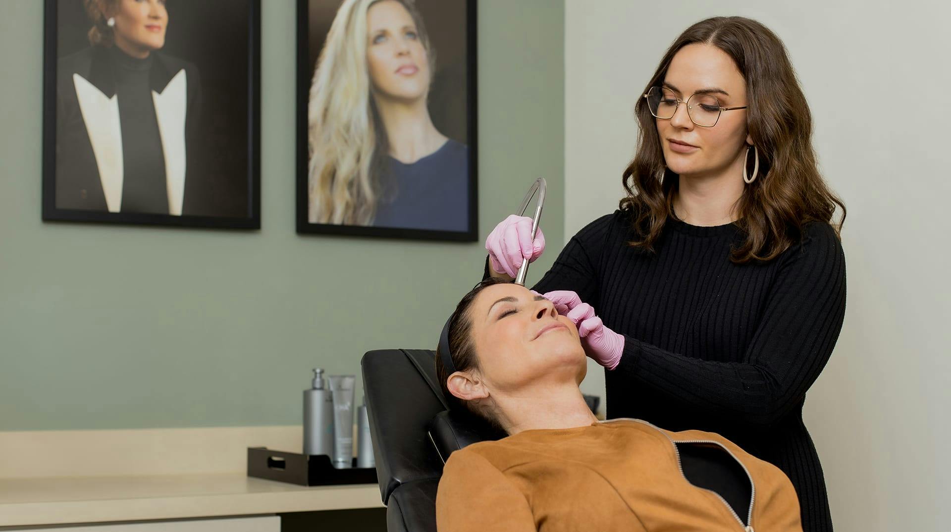 patient receiving facial treatment