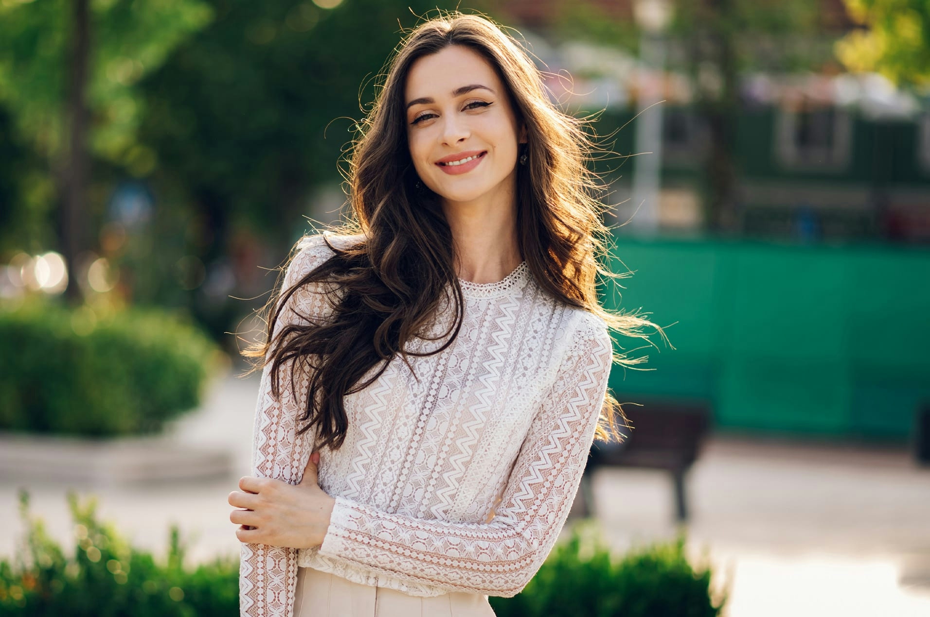 Woman smiling outdoors