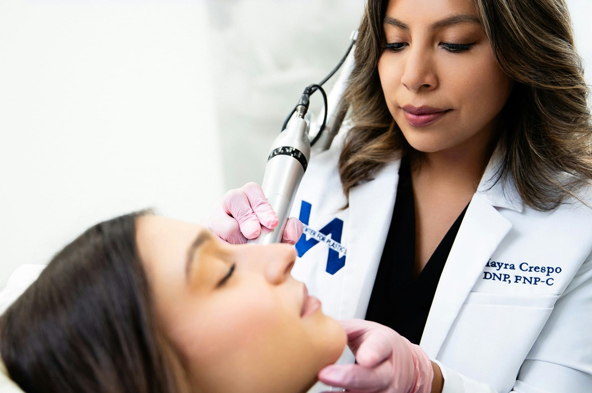 Woman getting face treatment