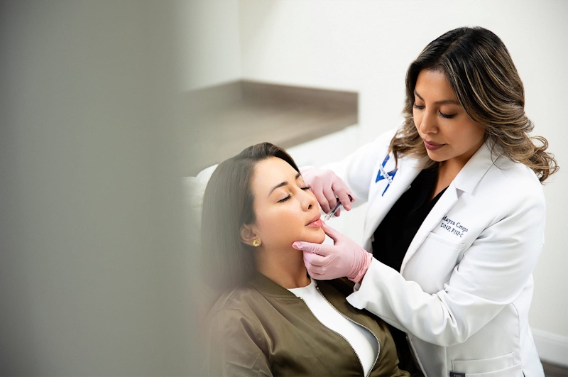 Nurse administering lip filler