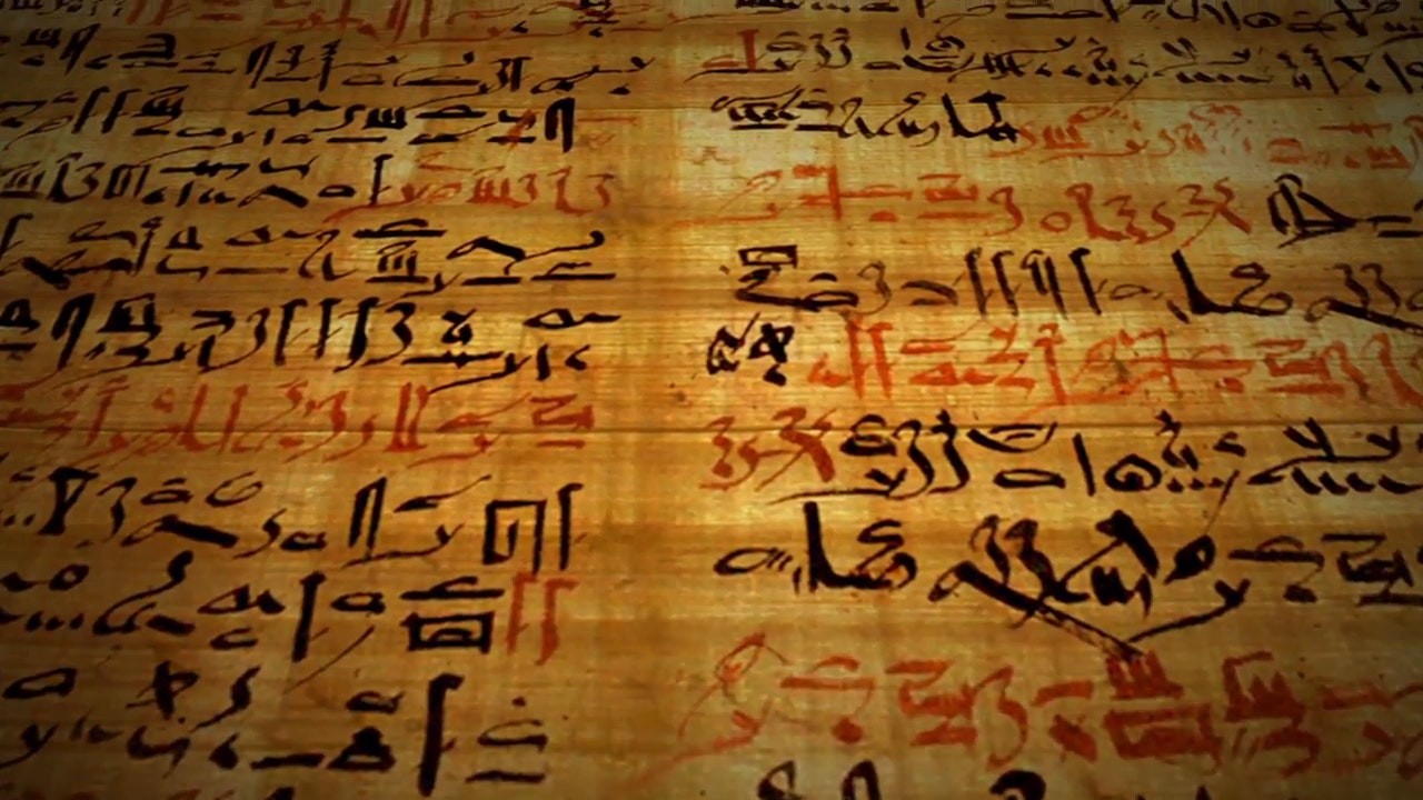 Ancient writing on papyrus scroll