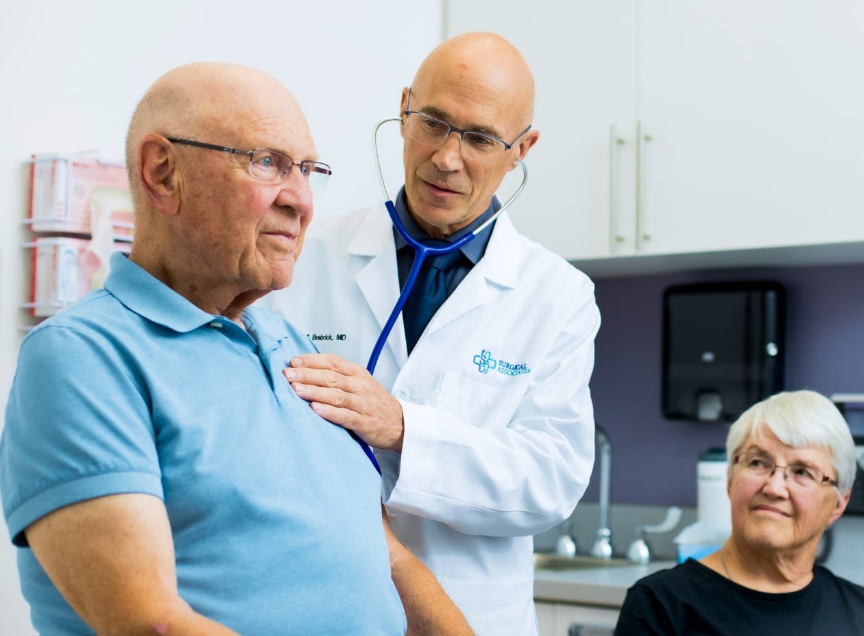 Doctor treating a patient