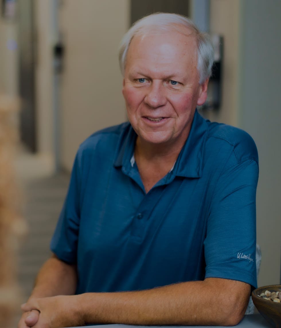 patient leaning on front desk