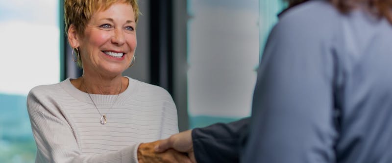 two people shaking hands