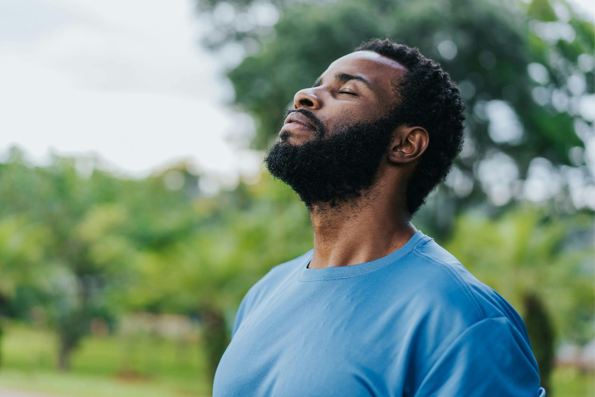 man soaking in the outdoors