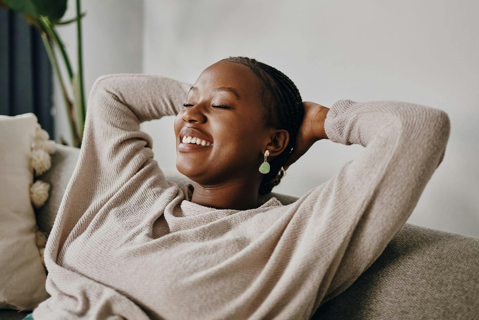woman relaxing on couch