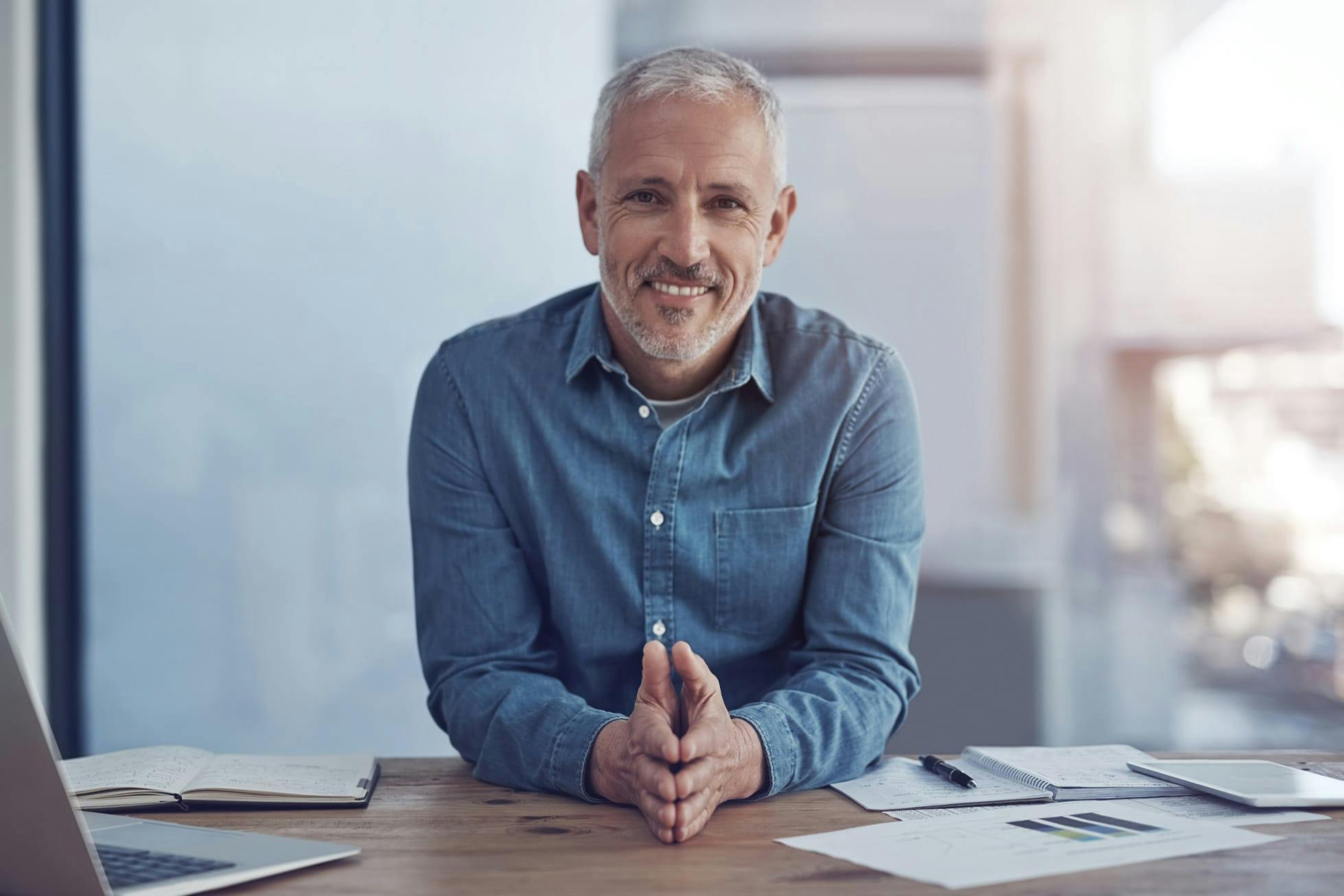 man at company desk