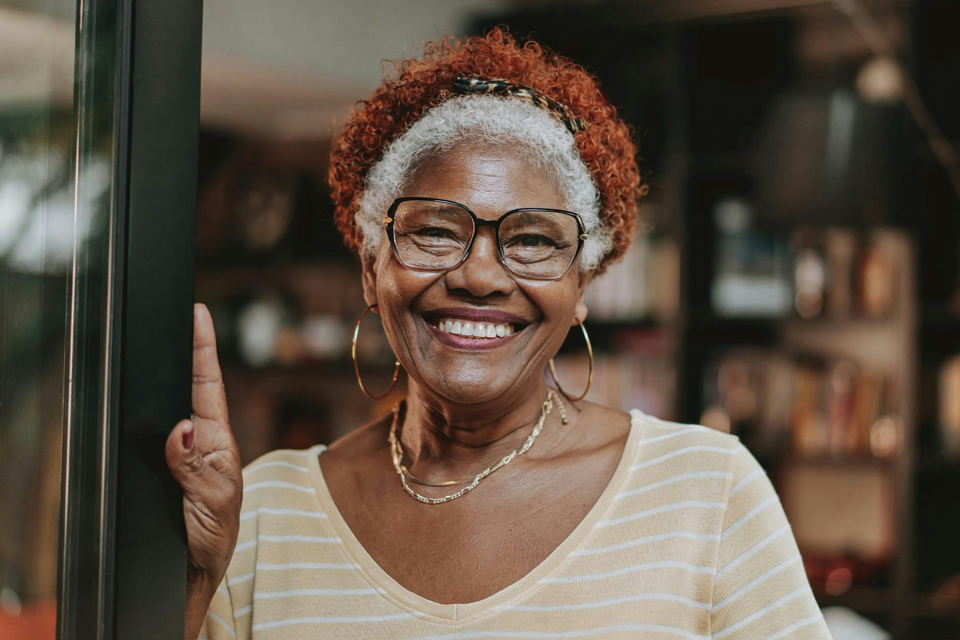smiling woman in doorway