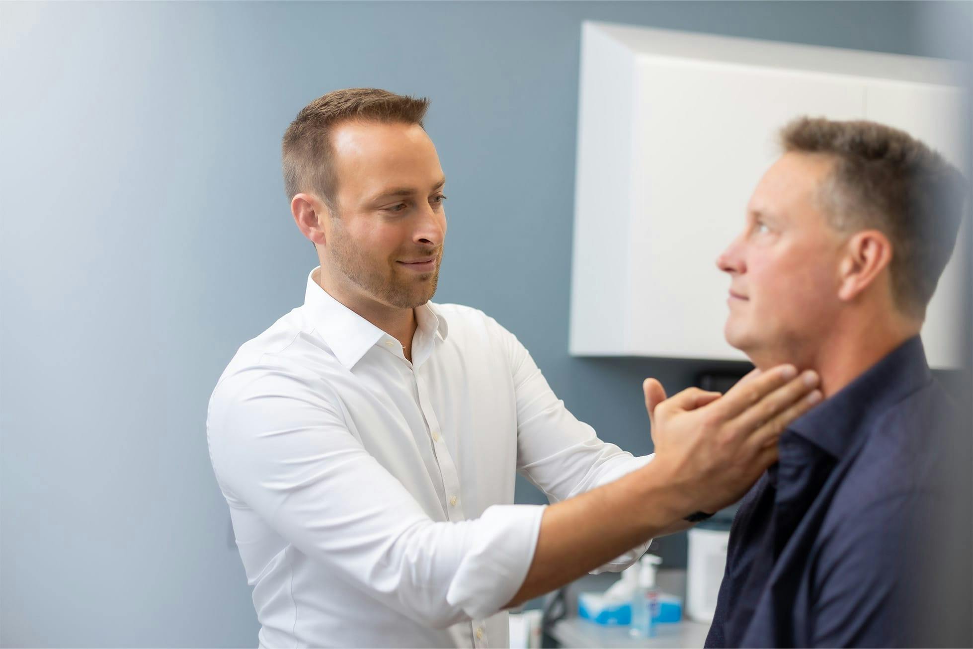 doctor checking patient