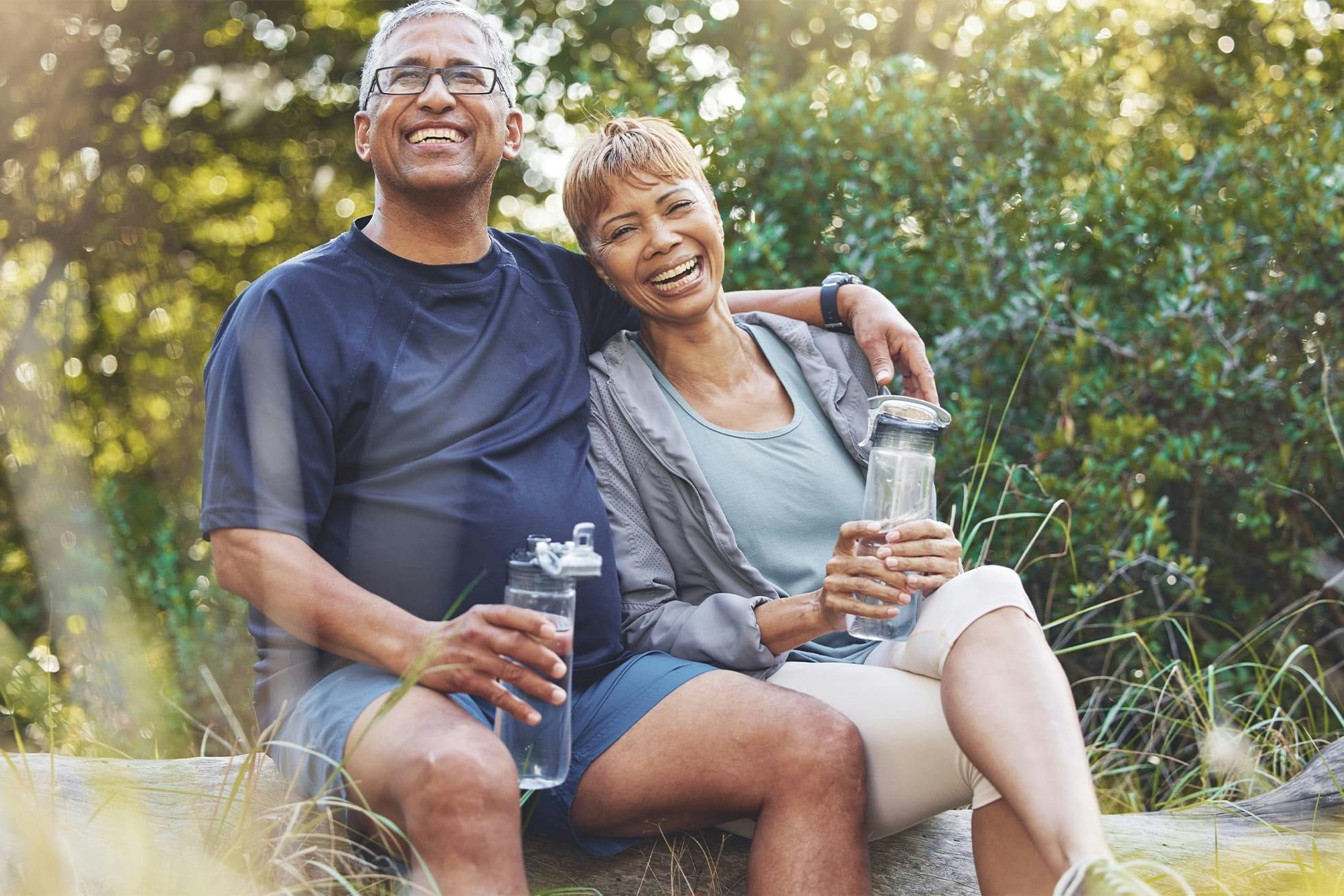 couple resting on hike