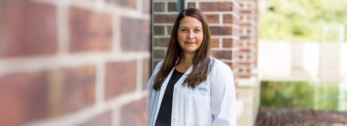 doctor standing outside building
