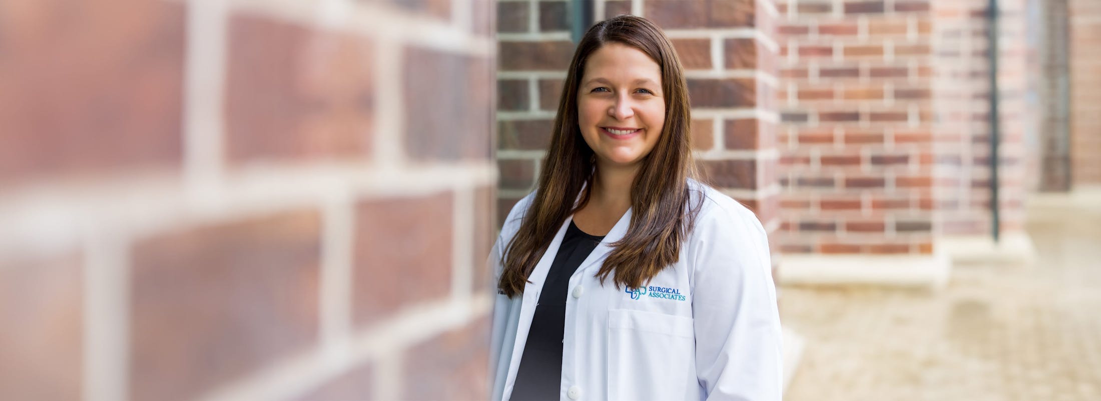 Dr. Stacey LeJeune standing outside building