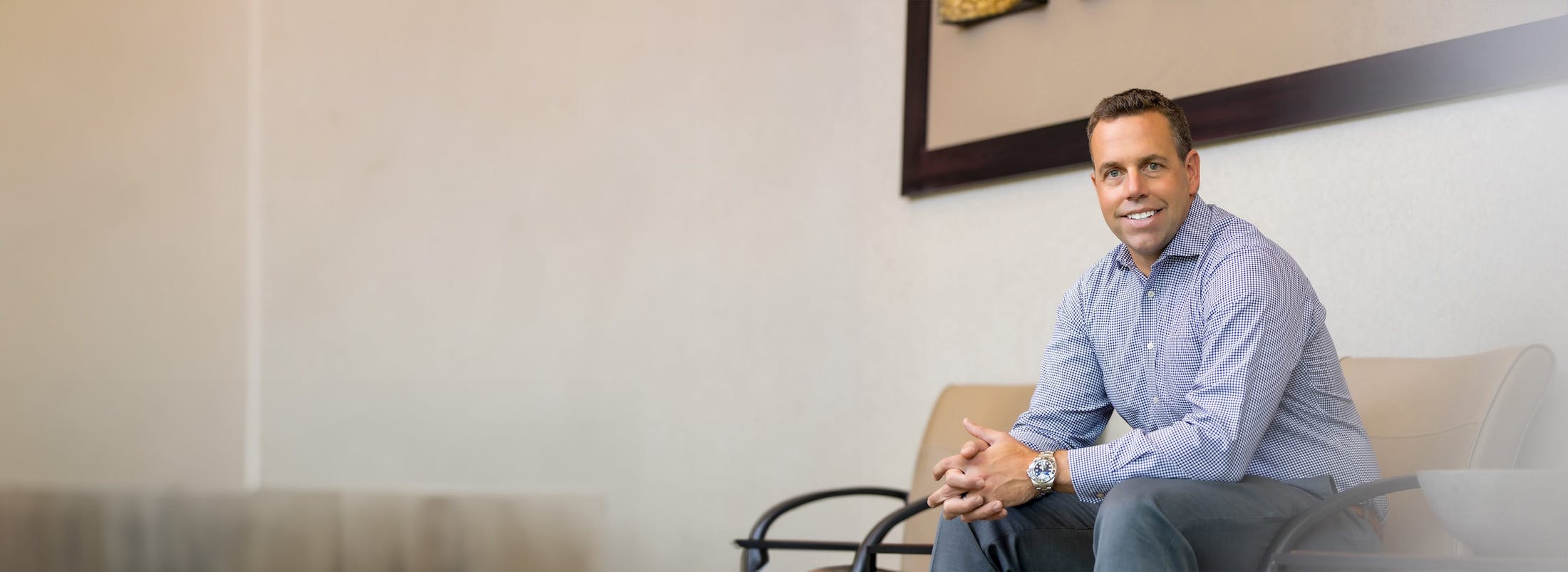 Dr. Benjamin J. Herdrich sitting in office