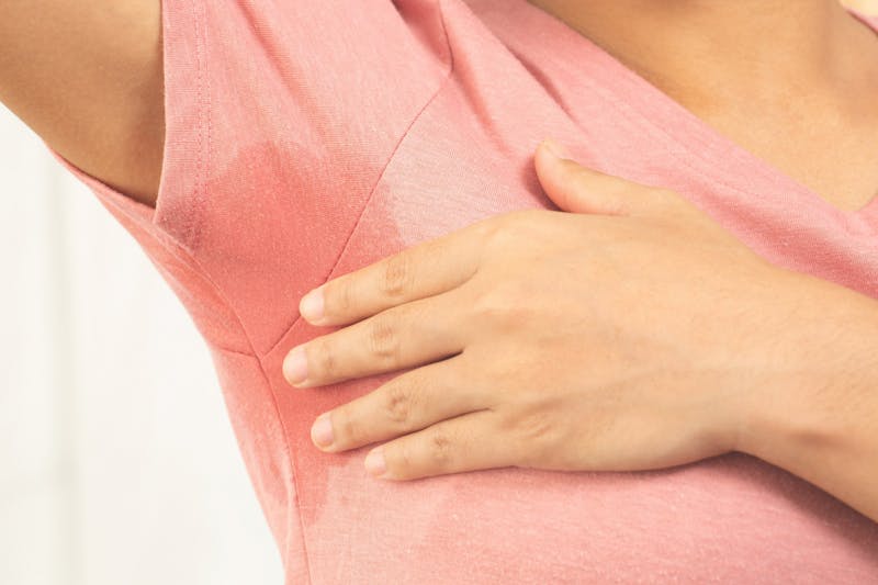 Woman with Armpit sweat