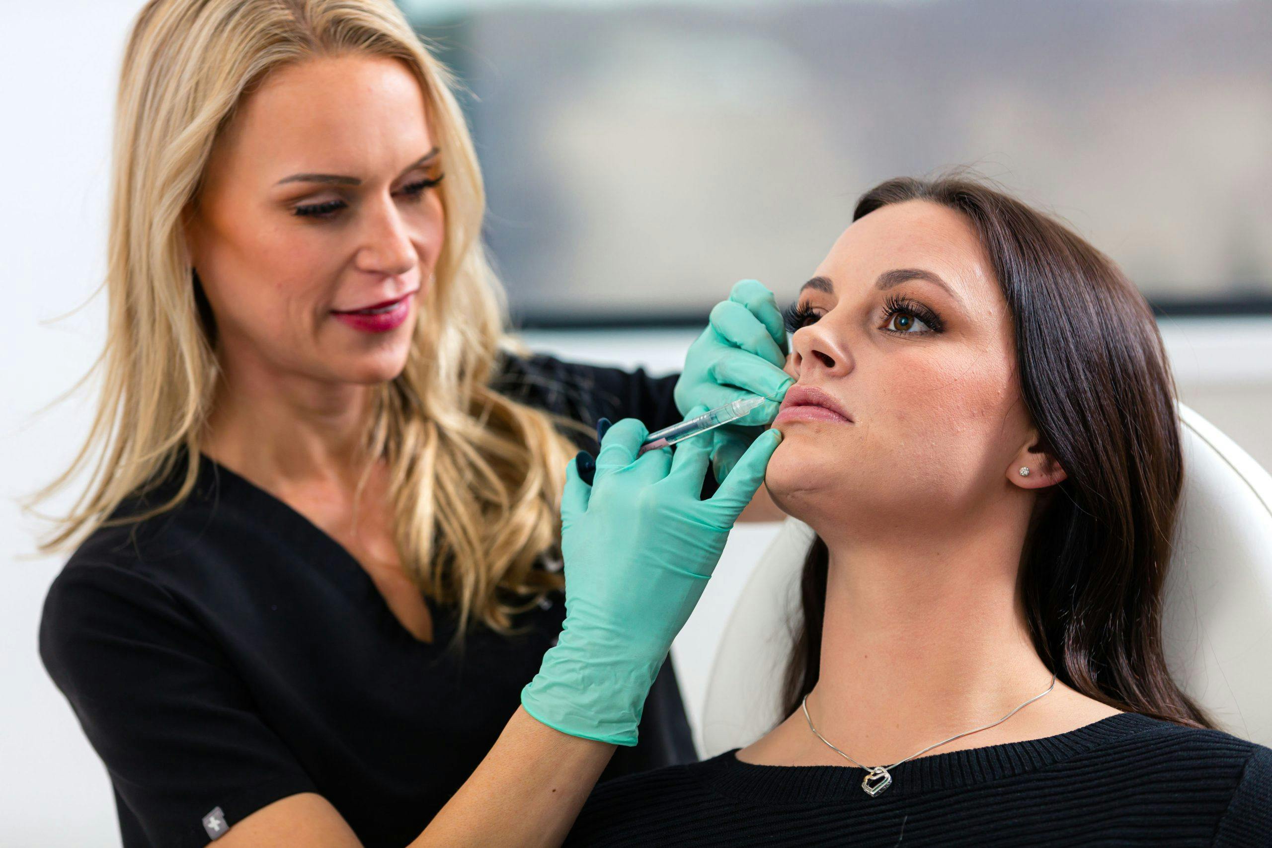 Patient receiving lip fillers