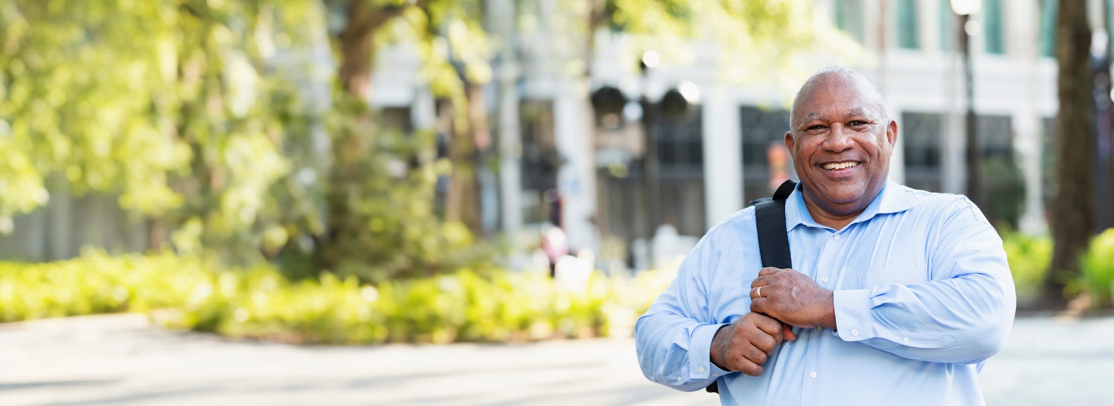 man outside smiling