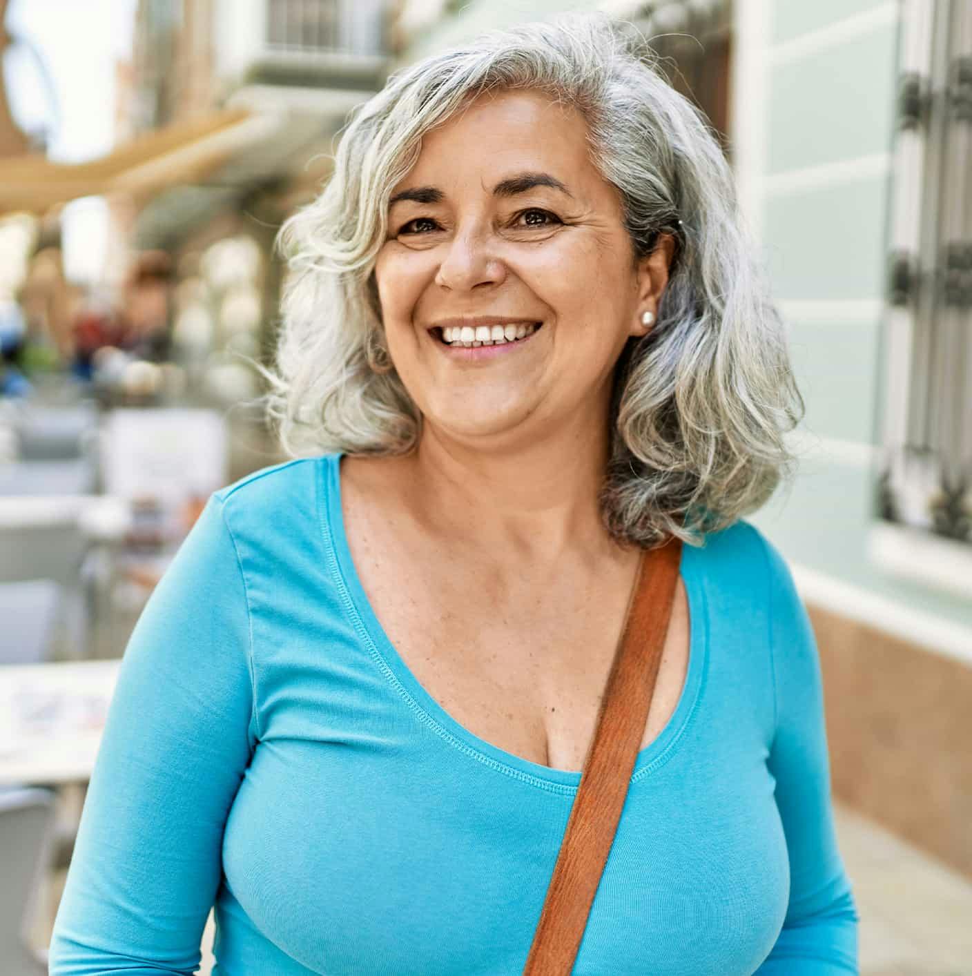 Woman outside smiling