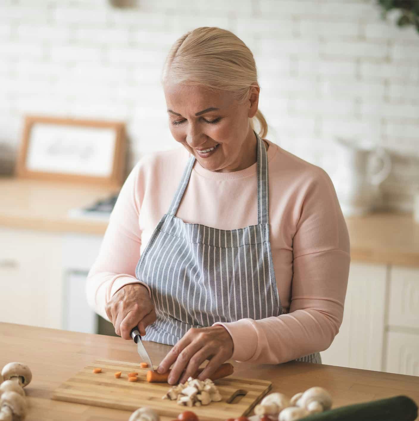 Woman cutting vegetables