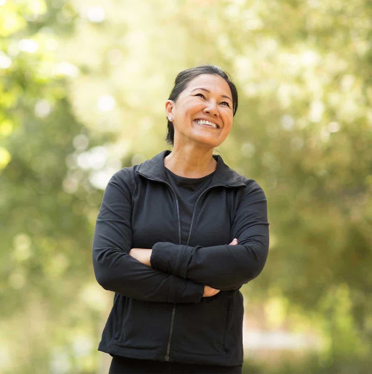 Woman outdoors smiling