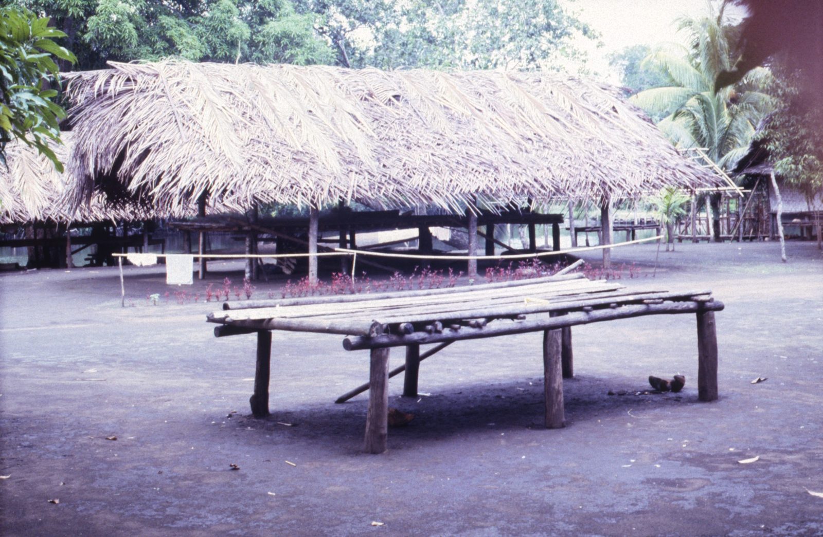The form the community knew, found in Mike Austin's archive: a raised sitting platform from the Ramu region of Papua New Guinea.