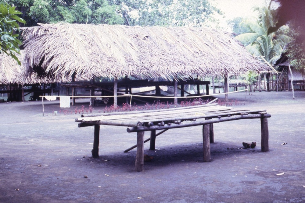 The form the community knew, found in Mike Austin's archive: a raised sitting platform from the Ramu region of Papua New Guinea.