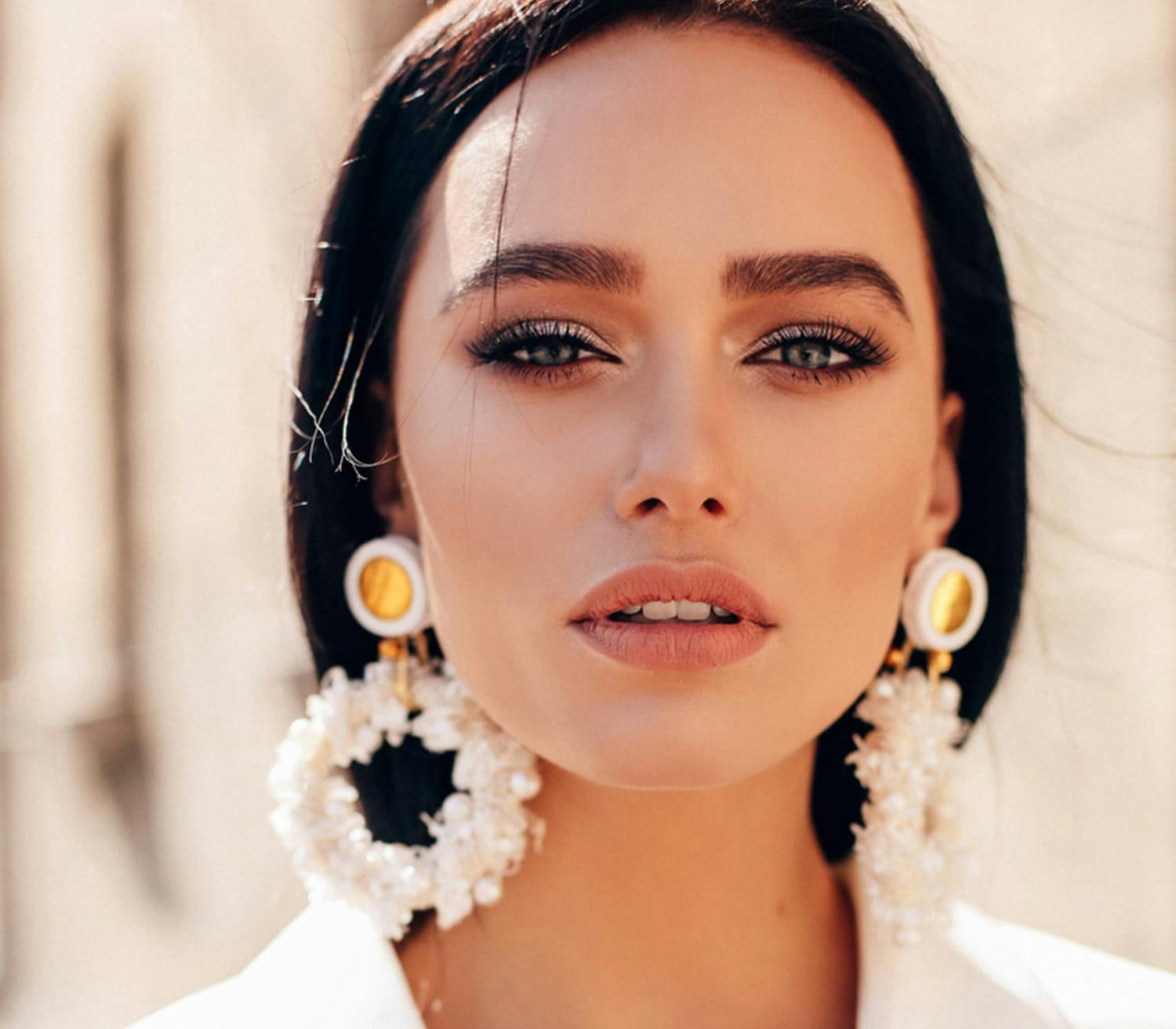 woman with big earrings