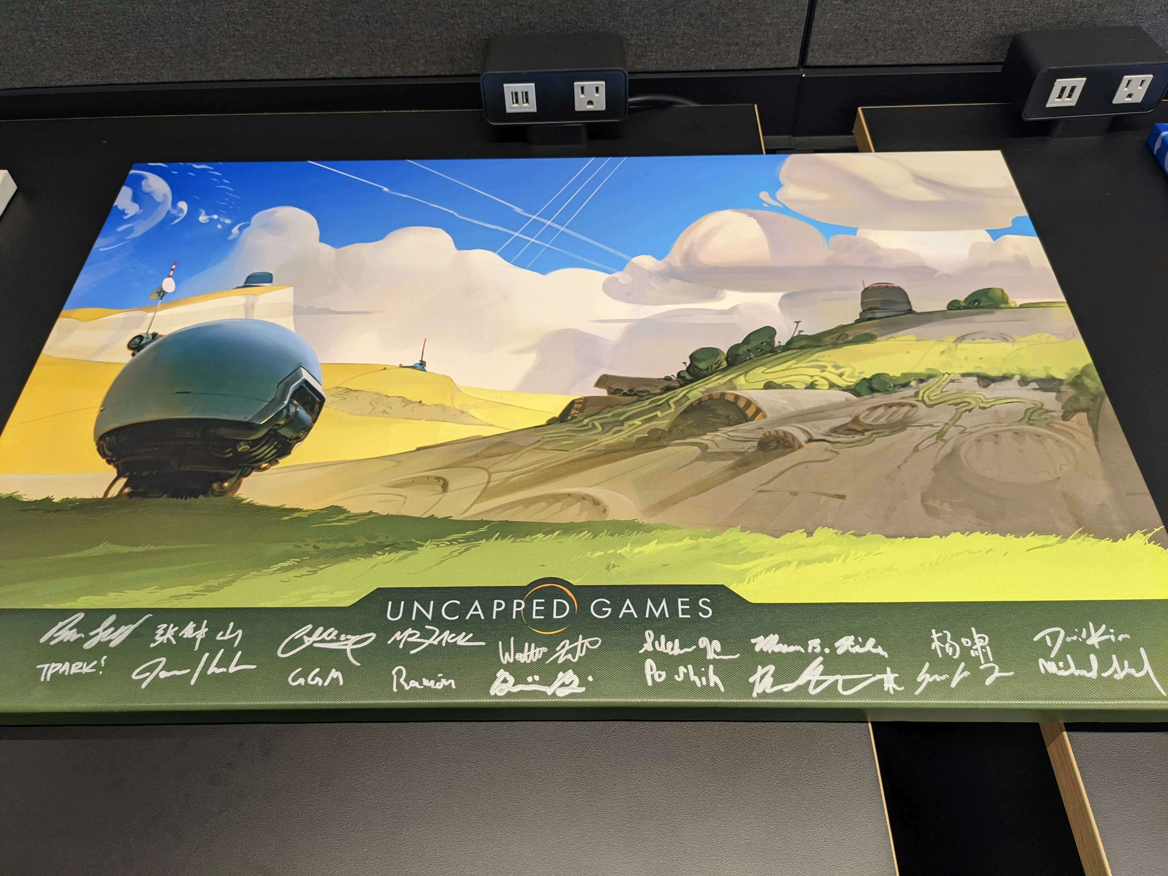 First team gift from that tournament: signed concept art of what we imagined Battle Aces would look like.